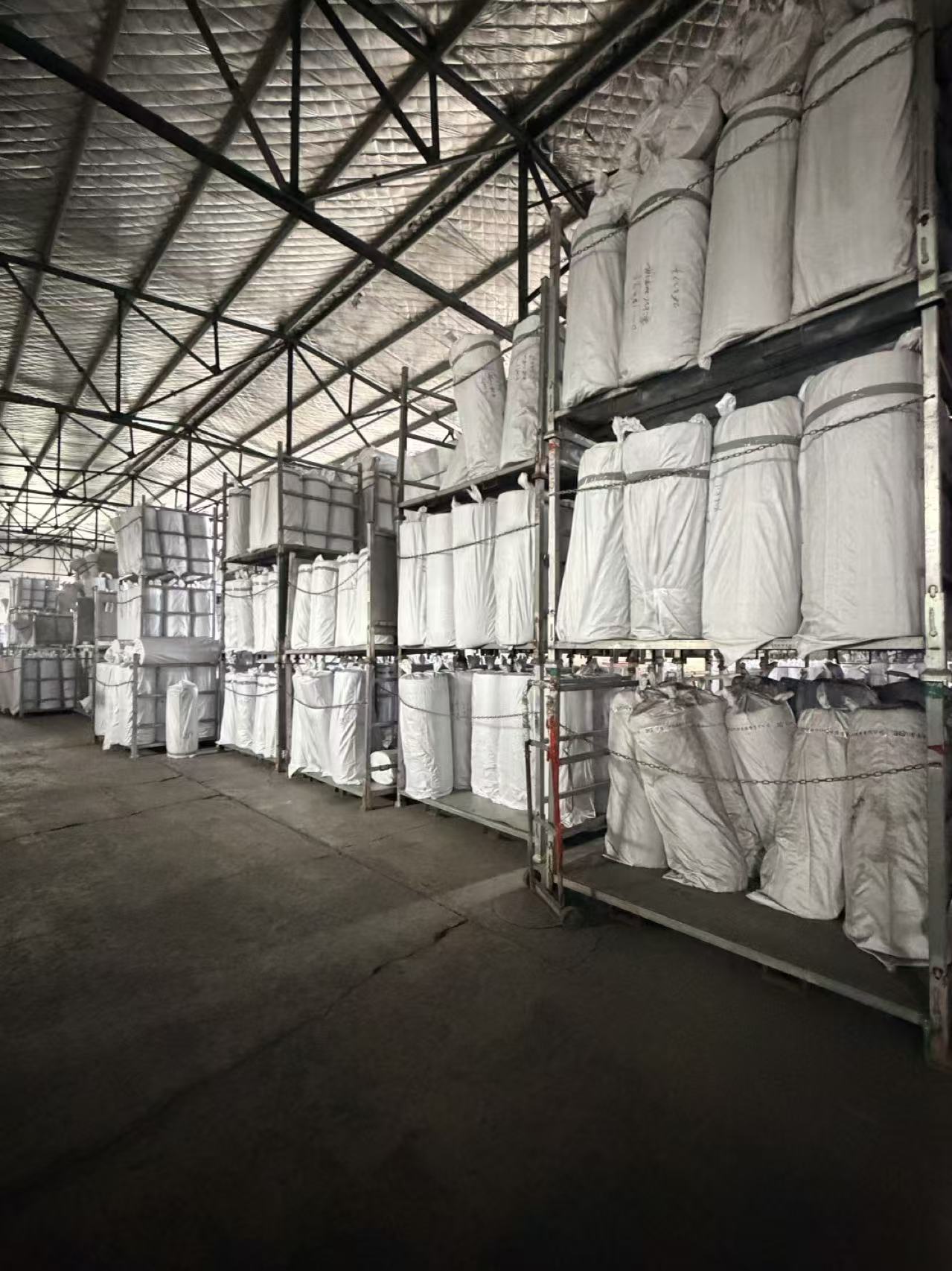 Packed material rolls in warehouse
